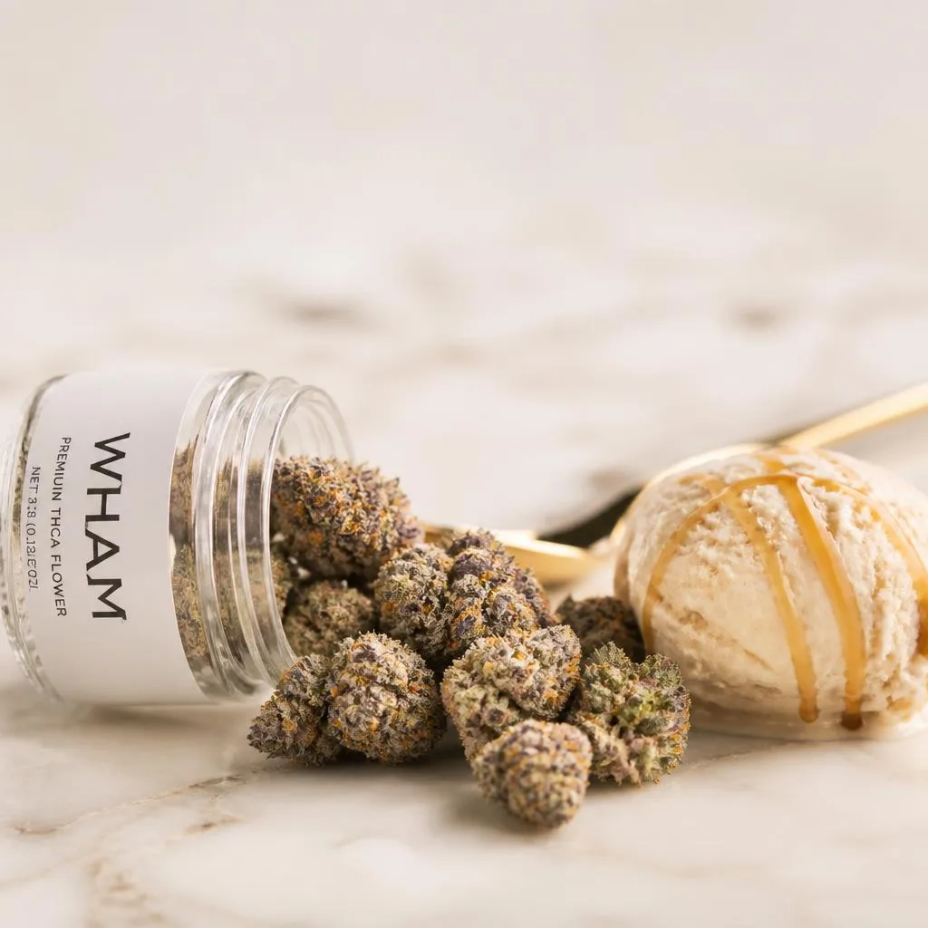 Frosty dessert THCa flower spilling from a WHAM jar on marble, sweet creamy styling.